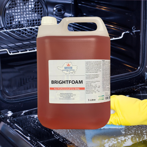 large bottle of brightfoam in front of a oven being cleaned