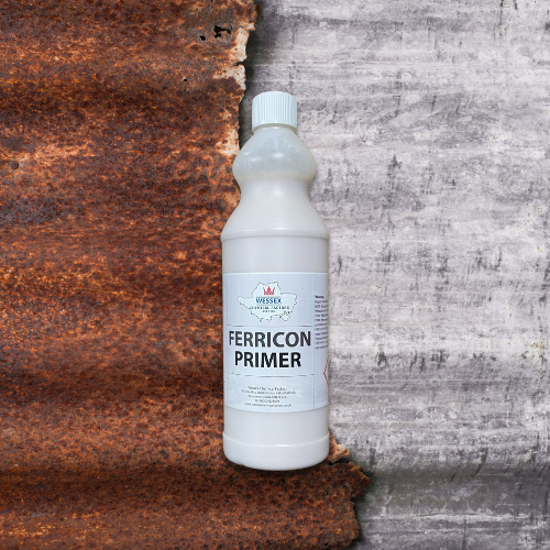 bottle of ferricon primer in front of rested metal