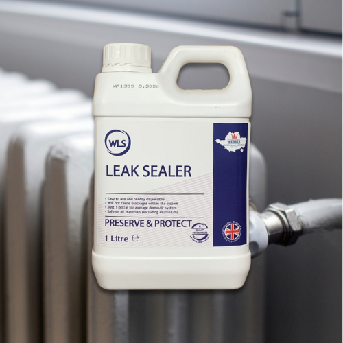 bottle of leak sealer in front of a white radiator