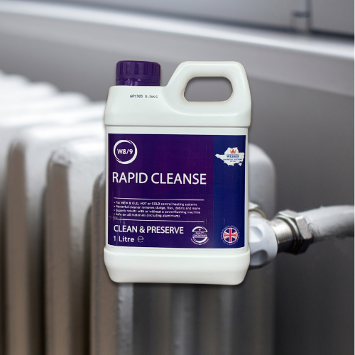 bottle of rapid cleanse in front of a white radiator