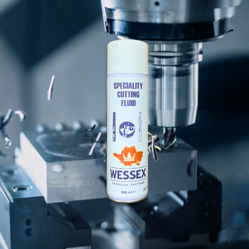 spray can of speciality cutting fluid in front of metal cutting