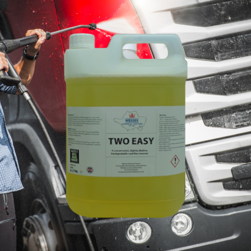 bottle of two easy in front of lorry being jet washed